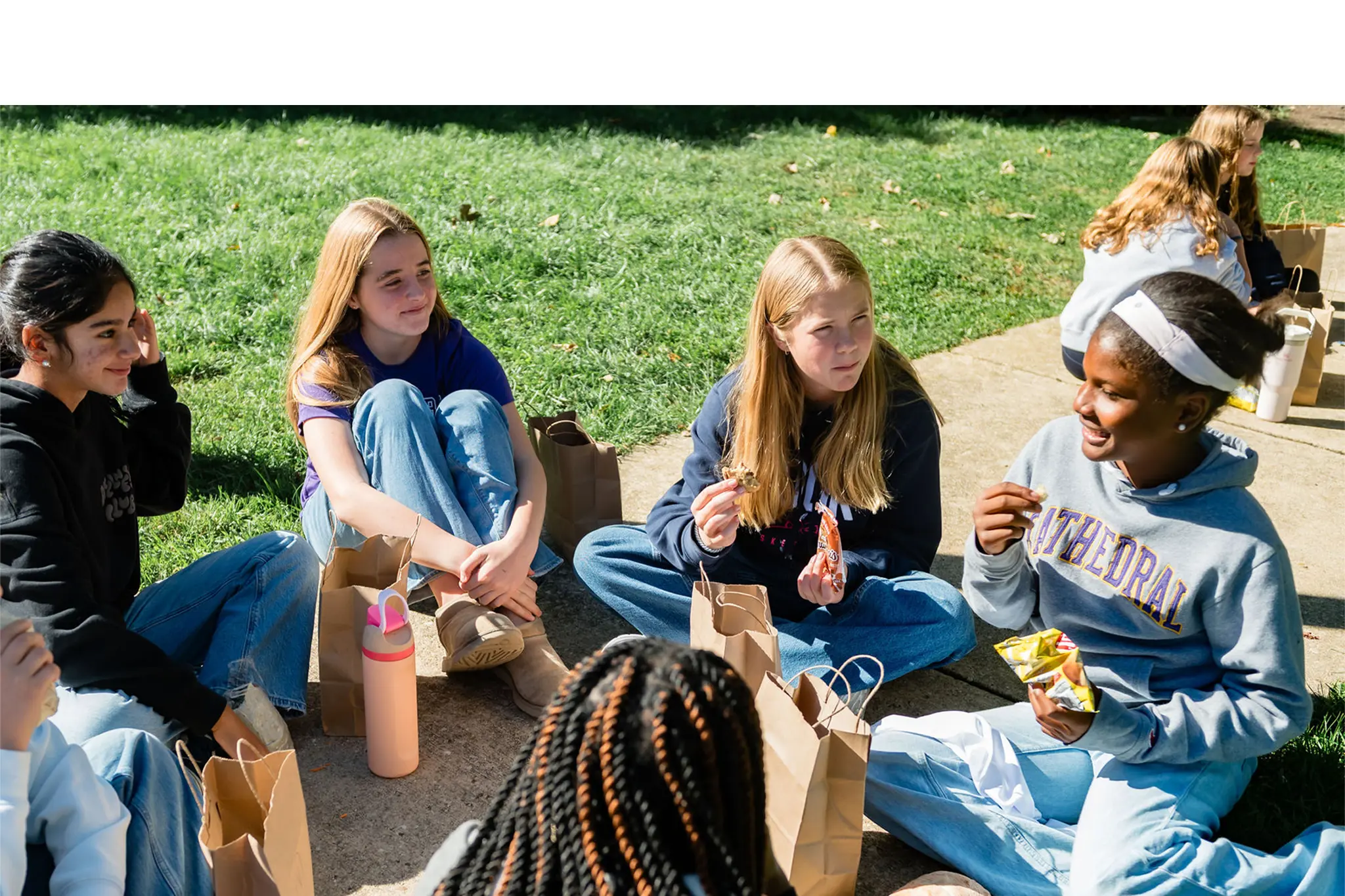 girls at NCS sitting outside