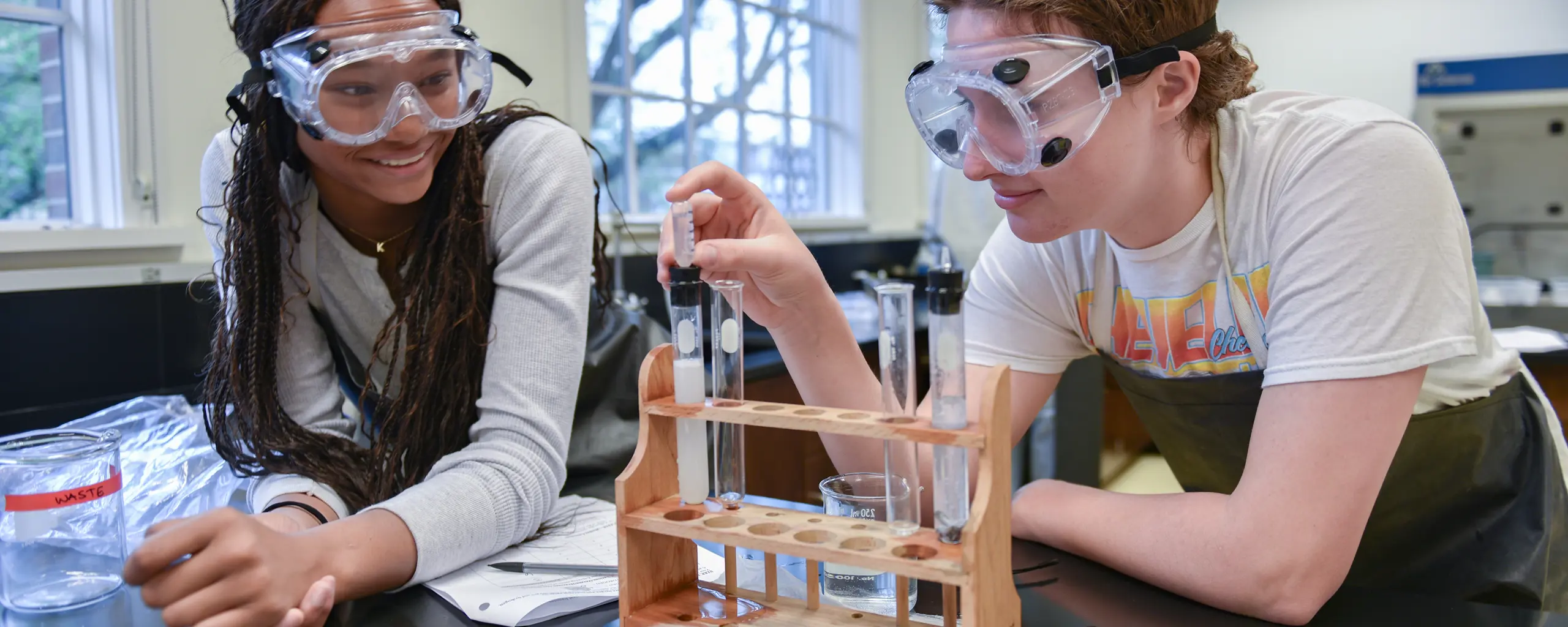 Two NCS girls on lab with goggles on